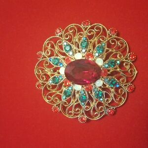 Vintage-Inspired Gold and Red Brooch
